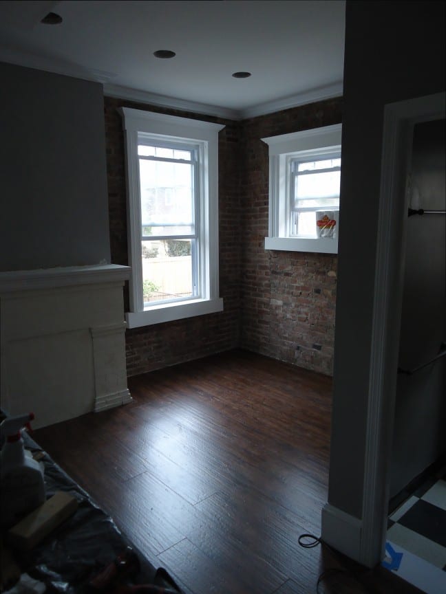 Finished kitchen repair area with wood flooring